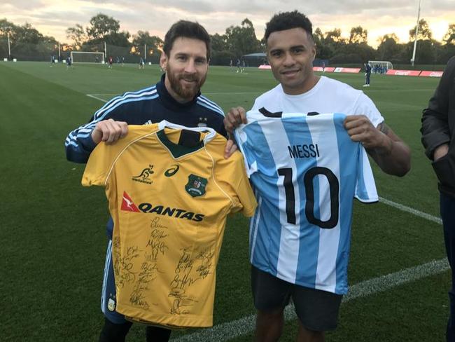 Will Genia (R) with Argentine superstar Lionel Messi. Picture: ARU