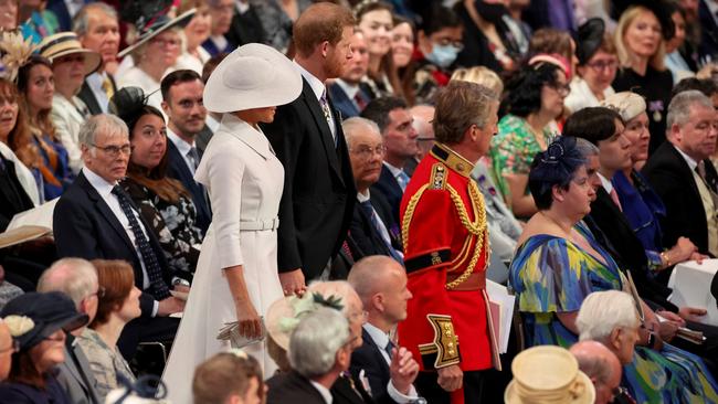 Prince Harry and Meghan, Duchess of Sussex walk towards their seats in the church. Picture: Phil Noble - WPA Pool/Getty Images