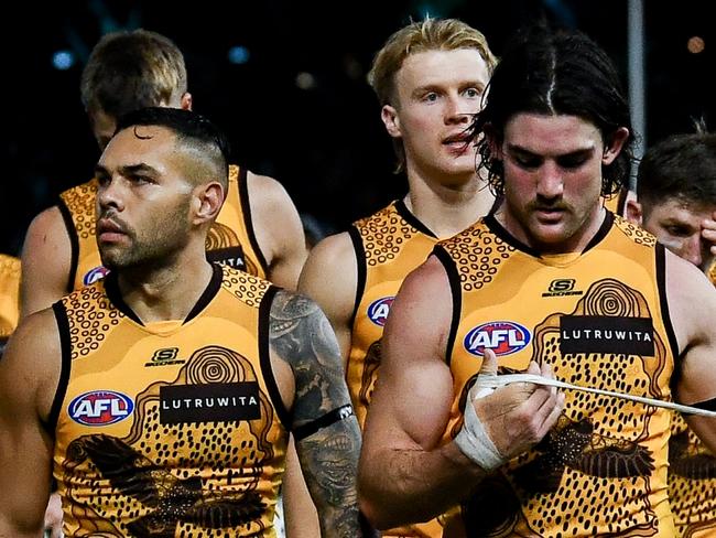 ADELAIDE, AUSTRALIA - MAY 19: Hawthorn players  leave the ground after losing  the round 10 AFL match between Yartapuulti (the Port Adelaide Power) and Hawthorn Hawks at Adelaide Oval, on May 19, 2024, in Adelaide, Australia. (Photo by Mark Brake/Getty Images)