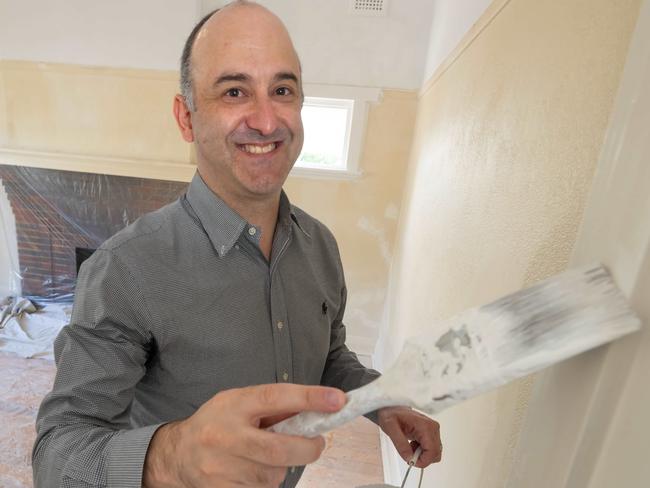 Frank Triantafyllou has tackled a dozen home updates across his own properties and investments. And he's reliably found the easiest way to add value is a simple lick of fresh paint. Solar panels, squeezing an extra bedroom into a floorplan, a replacement kitchen bench and new bathroom tiling could be enough to add $100,000 to the value of Melbourne's dated and daggy homes. Picture: Tony Gough