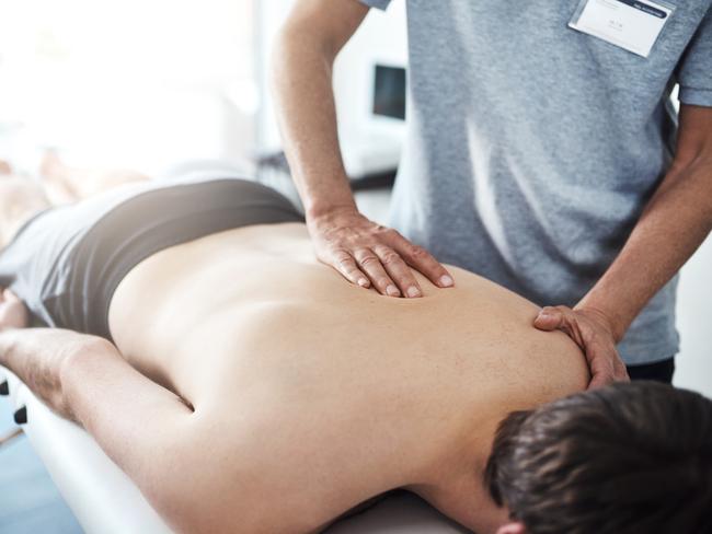 Closeup shot of an unrecognizable physiotherapist treating a patient