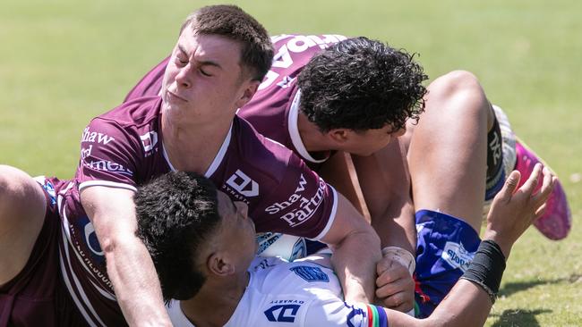 Oscar Crotty makes a tackle. Picture: Julian Andrews