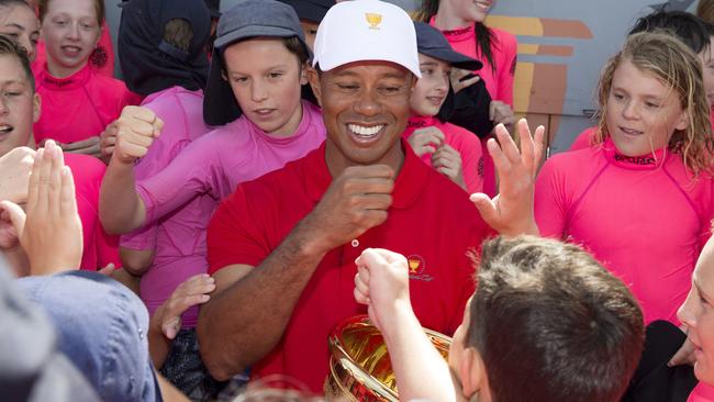 Tiger Woods was king of the kids with students from Brighton Primary School. Pic: Michael Klein