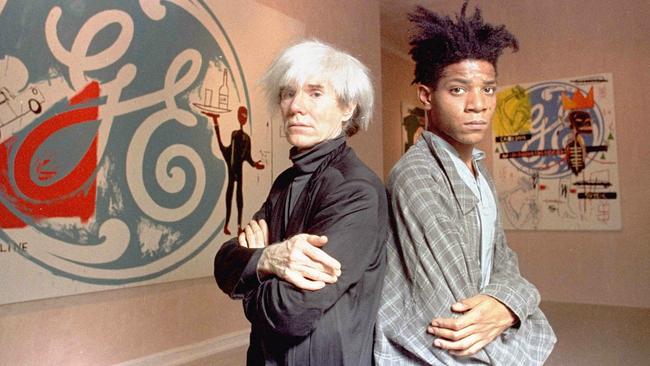 Jean-Michel Basquiat (right) with Andy Warhol during a famous joint exhibition.