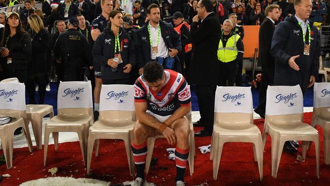 Only once the game was wrapped up could Cronk rest. (AAP Image/Dean Lewins)