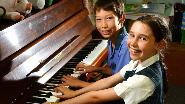 Robertson State School students will perform at a special Anzac Day concert at Brooklands Retirement Village during the lead-up to Anzac Day. Music captains Ethan Morrison and Grace Farmer are looking forward to it. Picture: Peter Cronin