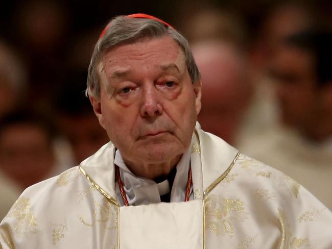 VATICAN CITY, VATICAN - MARCH 26:  Australian cardinal George Pell attends the Easter vigil mass celebrated by Pope Francis at St. Peter's Basilica on March 26, 2016 in Vatican City, Vatican. Pope Francis on Friday evening presided over the Stations of the Cross in the Coliseum. During his prayer at the end of the service, the Holy Father ÃÅ lamented the those Christians killed for their faith by 'barbarous blades amid cowardly silence'.  (Photo by Franco Origlia/Getty Images)