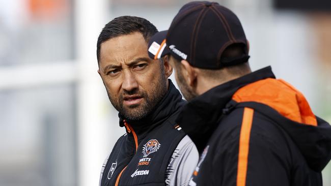 DAILY TELEGRAPH JUNE 27, 2023. Assistant coach Benji Marshall with Robbie Farah during West Tigers training at Concord Oval. Picture: Jonathan Ng