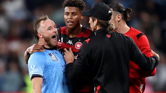 SYDNEY, AUSTRALIA - MAY 06: Rhyan Grant of Sydney FC celebrates in front of the Wanderers bench at full-time during the A-League Men's Elimination Final match between Western Sydney Wanderers and Sydney FC at CommBank Stadium, on May 06, 2023, in Sydney, Australia. (Photo by Brendon Thorne/Getty Images)