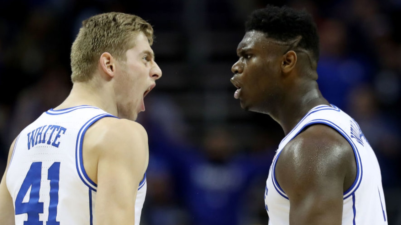 CHARLOTTE, NORTH CAROLINA - MARCH 16: Teammates Zion Williamson #1 and Jack White #41 of the Duke Blue Devils react against the Florida State Seminoles during the championship game of the 2019 Men's ACC Basketball Tournament at Spectrum Center on March 16, 2019 in Charlotte, North Carolina. (Photo by Streeter Lecka/Getty Images)