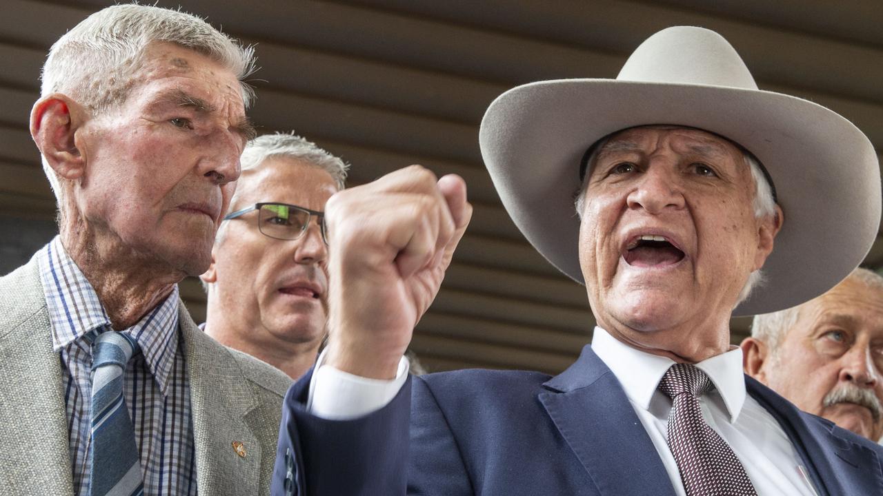 Federal MP Bob Katter, pictured with farmer Charlie Phillott (left), interrupted the banking royal commission with an outburst today. Picture: AAP Image/Glenn Hunt