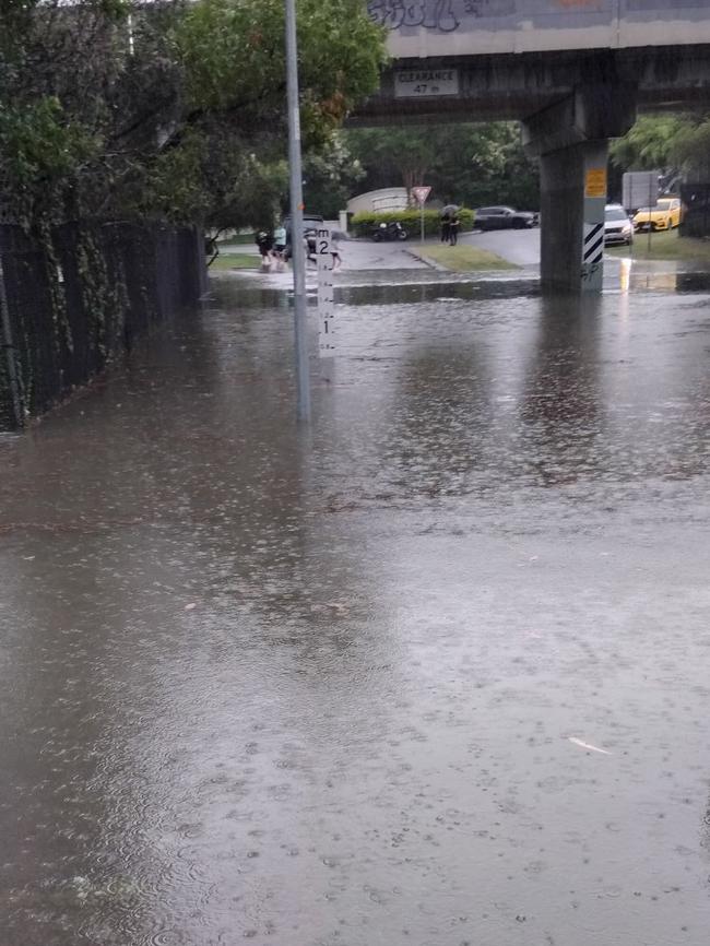 Flash Flooding at Carrara on Saturday afternoon. Picture: Mandy Bentley.