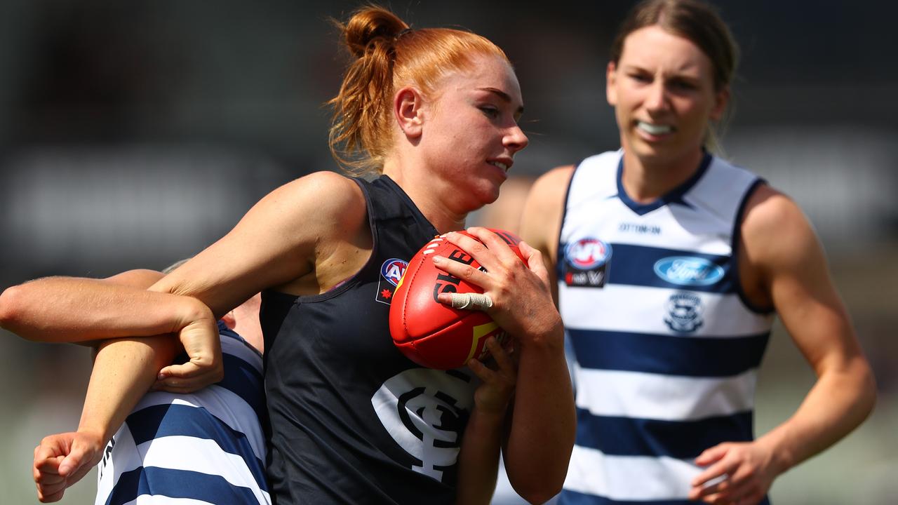 Grace Egan is locked up in a Geelong tackle.