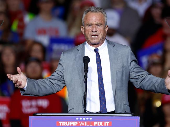 (FILES) Former Republican presidential candidate Robert F. Kennedy Jr. gestures as he speaks ahead of Former US President and Republican presidential candidate Donald Trump at a campaign rally at the Fiserv Forum in Milwaukee, Wisconsin, November 1, 2024. US President-elect Donald Trump announced on Thursday that he is nominating Kennedy to be the US Secretary of Health and Human Services. (Photo by KAMIL KRZACZYNSKI / AFP)