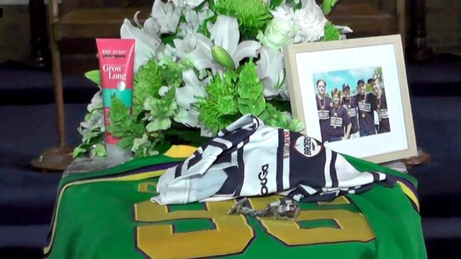 Archie Gouldson’s coffin was decorated with sporting jerseys, a picture of his mates and a bottle of his favourite shampoo.