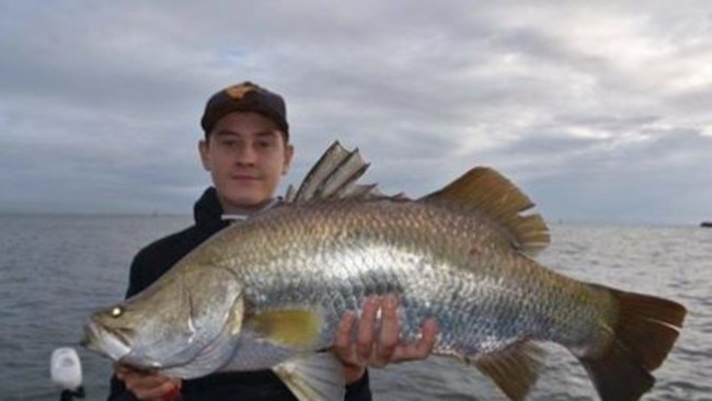 Lachlan Baker with a rare Brisbane River barramundi. Picture: Brisbane River Fishing/Facebook