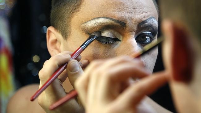 A dancer prepares for a nightly cabaret show in Mayak.