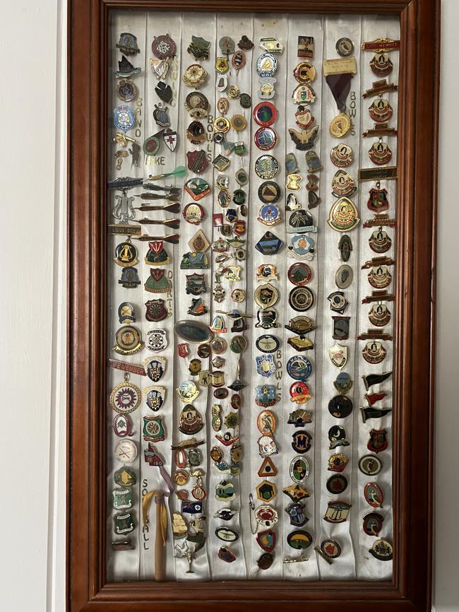 The badges Sylvia Moulds collected throughout her life.