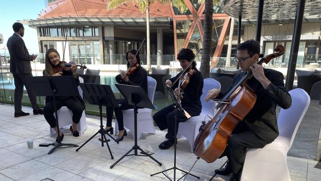 Musicians play for the crowd at the opening of The Langham. Picture: Kathleen Skene