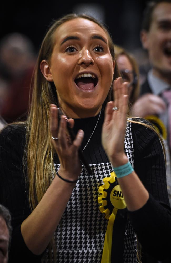 A Scottish National Party supporter celebrates the success. Picture: Andy Buchanan