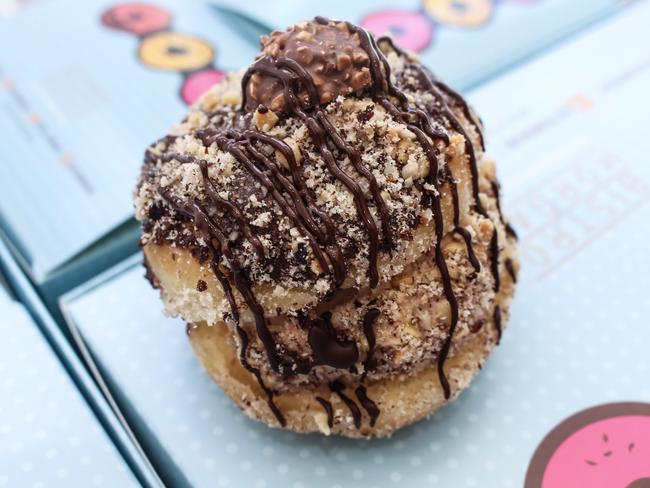 The Ferrero Rocher Ice Cream Doughnut, filled with Nutella ice cream, hazelnut crumb and dark chocolate drizzle. Picture: Supplied