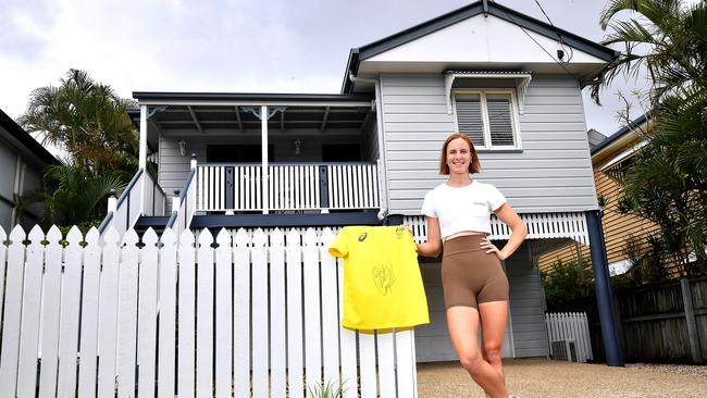 The home passed in for now, but its eventual buyer will get a signed shirt from the Tokyo Games. Picture: John Gass