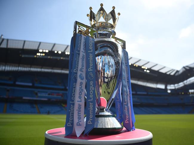 (FILES) In this file photo taken on May 06, 2018 The English Premier League football trophy is pictured before the English Premier League football match between Manchester City and Huddersfield Town at the Etihad Stadium in Manchester. - Professional Footballers' Association chief Gordon Taylor says Premier League players have "agreed to play their part" during the coronavirus pandemic as talks continue to find a collective pay deal on April 7, 2020. (Photo by Oli SCARFF / AFP) / RESTRICTED TO EDITORIAL USE. No use with unauthorized audio, video, data, fixture lists, club/league logos or 'live' services. Online in-match use limited to 75 images, no video emulation. No use in betting, games or single club/league/player publications. /