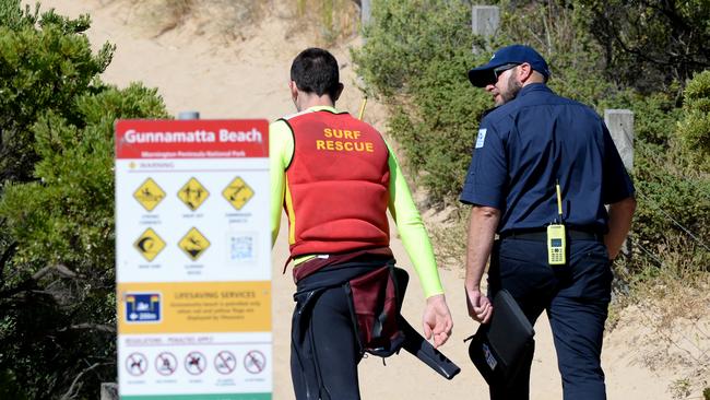 Search crews at Gunnamatta Beach. Picture: Andrew Henshaw