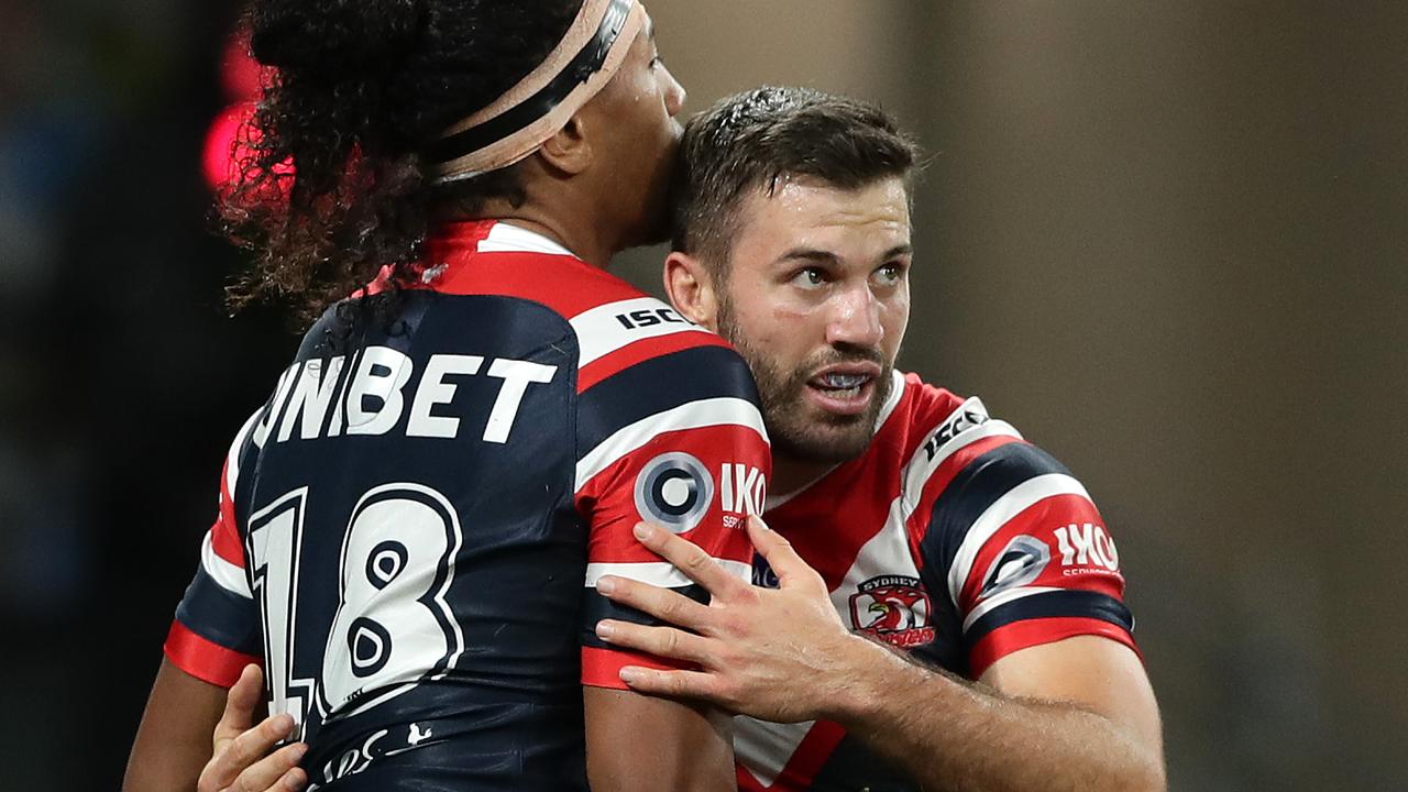 James Tedesco of the Roosters celebrates scoring a try.
