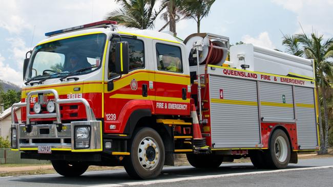 A fire truck returns to Finch Hatton to refill with water. QFES generic