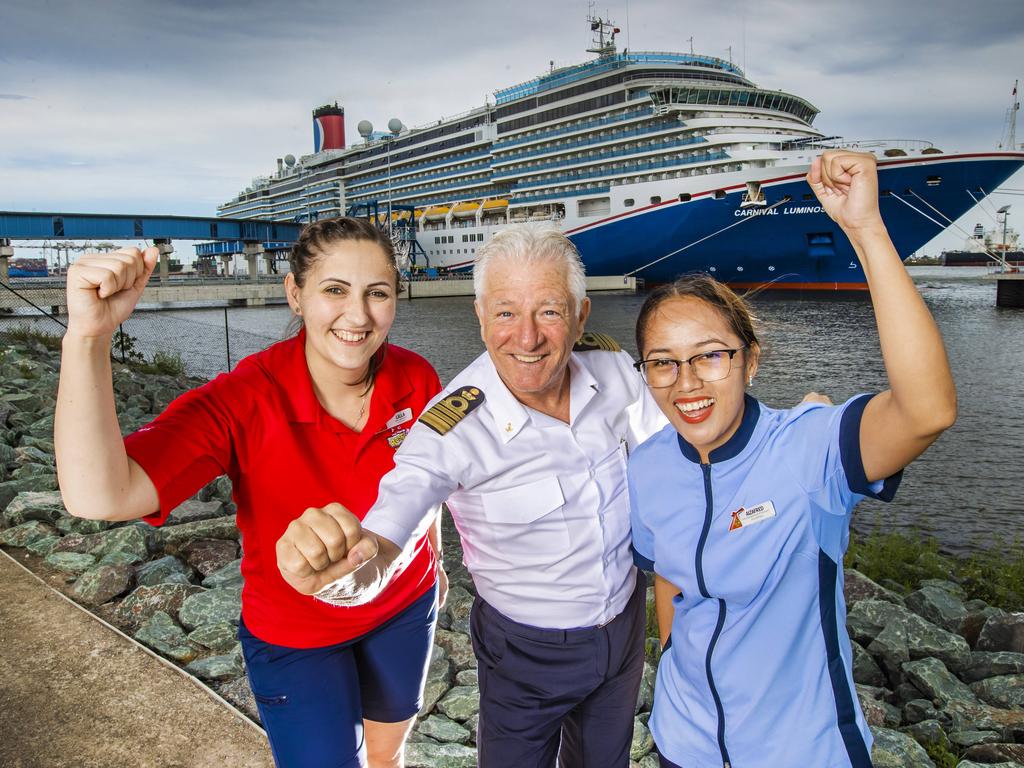 Lilla Czovek, Captain Adriano Binacchi and Aizafred Pecajas from Carnival Luminosa at Brisbane International Cruise Terminal. Picture: Nigel Hallett