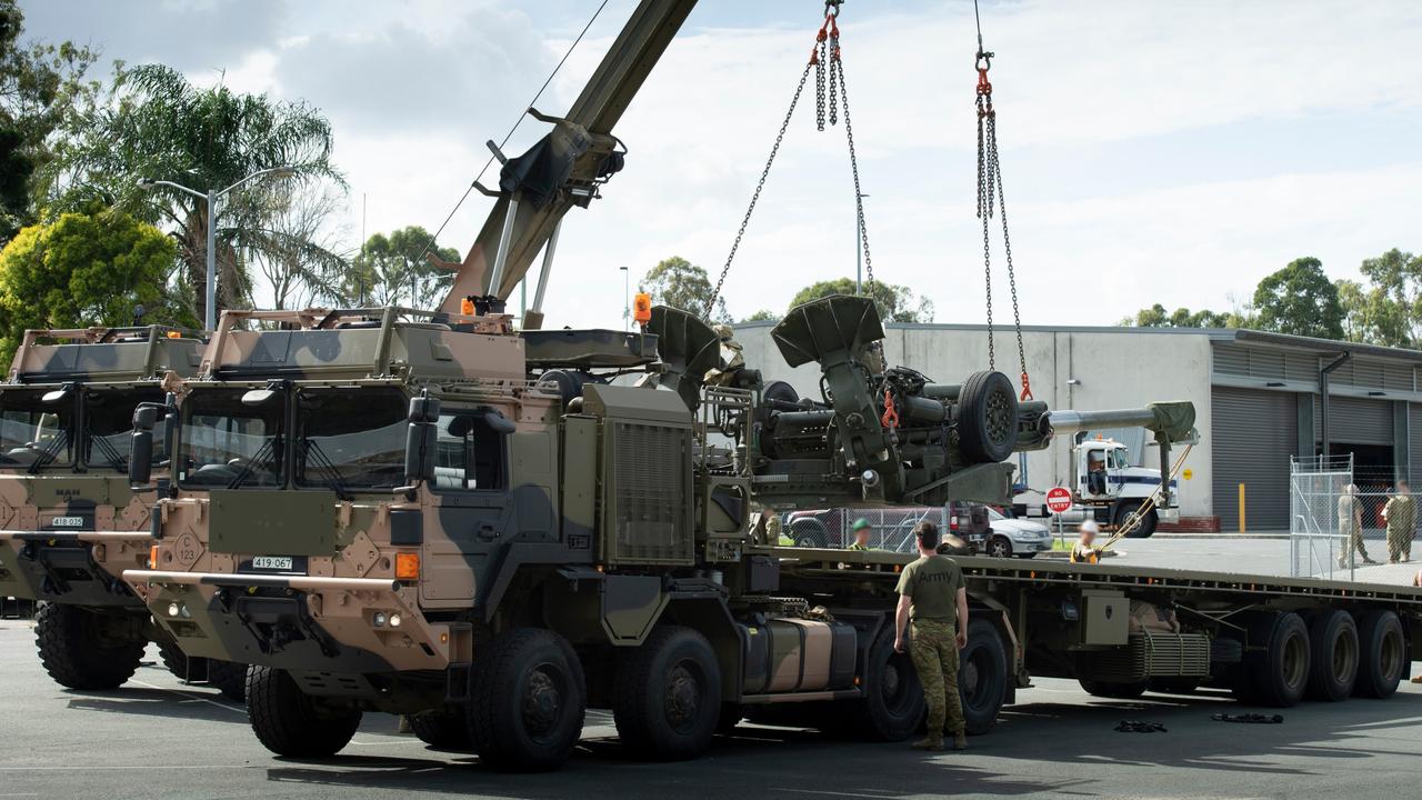 An M777 howitzer from 1st Regiment, Royal Australian Artillery, is prepared for transportation before being loaded onto a truck at Gallipoli Barracks in Brisbane.