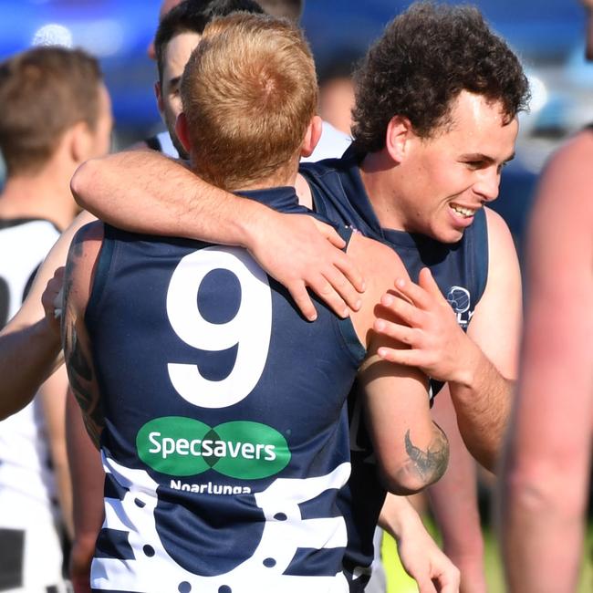 Noarlunga’s Troy Johnson (#9) celebrates with teammate. Picture: Keryn Stevens