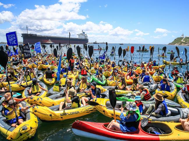 Climate protesters risked lives attempting to blockade access to Newcastle port on Sunday. Picture: Roni Bintang/Getty Images