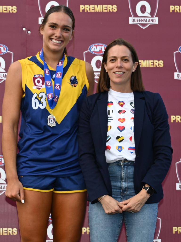 Head of AFL Queensland Trisha Squires with Havana Harris (left) of Bond University won the women's league best on ground award for the QAFL grand final. Picture: Supplied