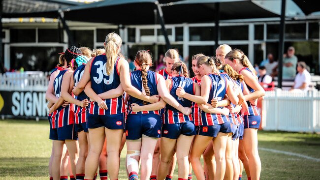 Wilston Grange girls muster during a break.