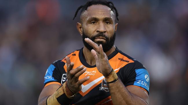 SYDNEY, AUSTRALIA - JUNE 15: Justin Olam of the Wests Tigers celebrate victory following the round 15 NRL match between Wests Tigers and Gold Coast Titans at Leichhardt Oval on June 15, 2024 in Sydney, Australia. (Photo by Jason McCawley/Getty Images)