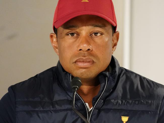 Tiger Woods of the United States speaks to the media during a captains press conference with Ernie Els of South Africa at a Presidents Cup Practice Day during the 2019 Presidents Cup golf competition at the Royal Melbourne Golf Club in Melbourne, Tuesday, December 10, 2019. (AAP Image/Scott Barbour) NO ARCHIVING, EDITORIAL USE ONLY