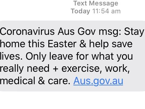 The government has sent its second emergency text to  Australians warning them to stay home over Easter.