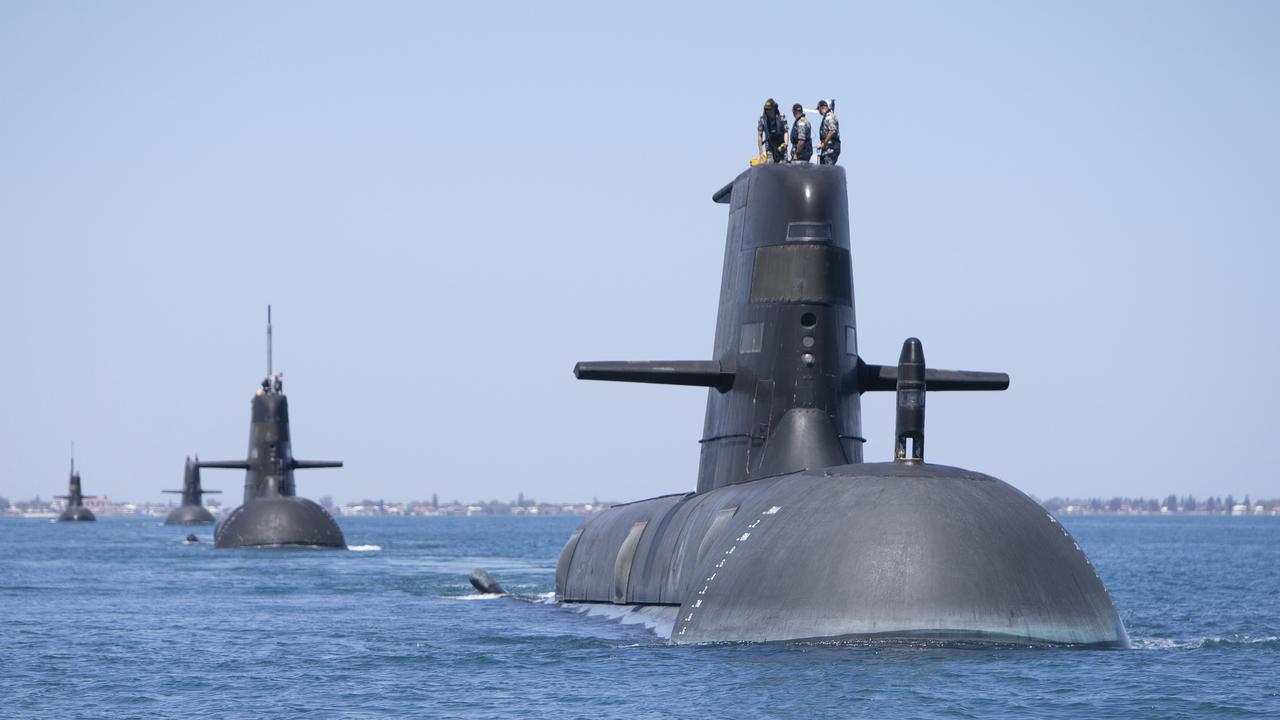 Four of the Adelaide-built Collins Class submarines. Photo: LSIS Richard Cordell