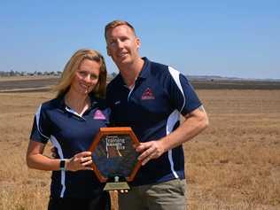 WINNERS: Astill's Electrical Services owners Amanda and Mick Astill with their Queensland Training Medium Employer award. Picture: Madeline Grace