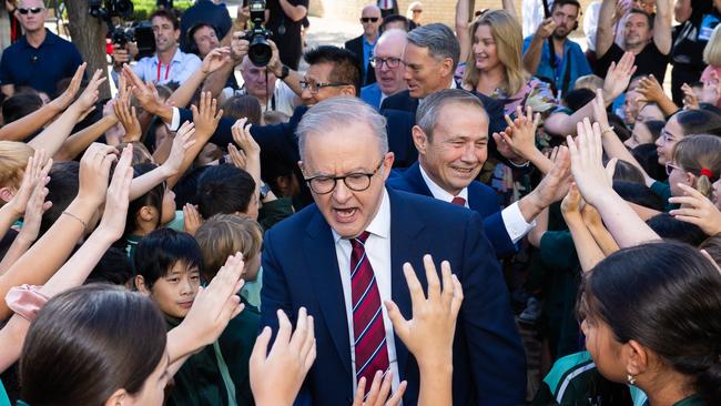 Anthony Albanese was swarmed by students at the Winthrop Primary School in the Perth seat of Tangney. Picture: Jason Edwards / NewsWire