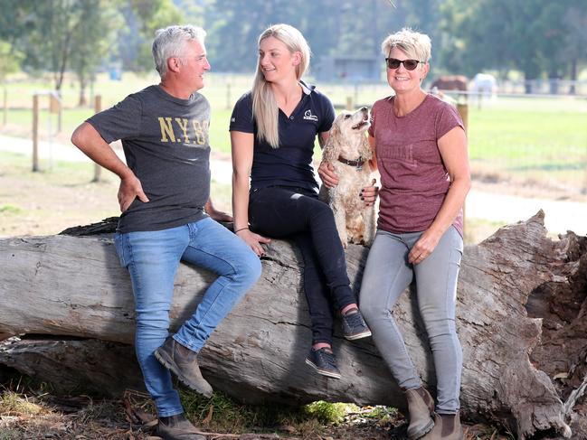 Jamie Kah with her parents John and Karen on the Mornington Peninsula. Picture: Alex Coppel