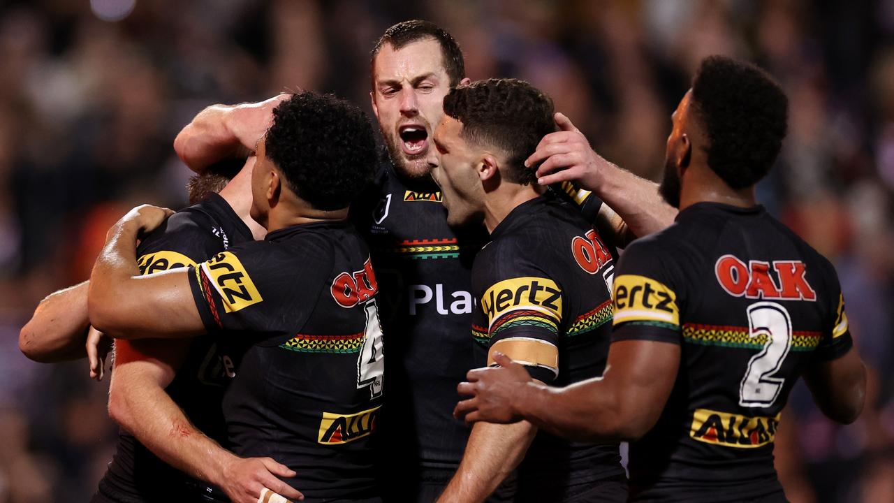 PENRITH, AUSTRALIA - SEPTEMBER 13: Luke Garner of the Panthers celebrates scoring a try with Paul Alamoti, Isaah Yeo and Nathan Cleary of the Panthers during the NRL Qualifying Final match between Penrith Panthers and Sydney Roosters at BlueBet Stadium on September 13, 2024 in Penrith, Australia. (Photo by Cameron Spencer/Getty Images)