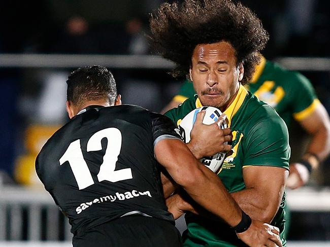 Felise Kaufusi of Australia is tackled by Isaac Liu of New Zealand during the Trans-Tasman showdown Test match between the Australian Kangaroos and the New Zealand Kiwis at Mt Smart Stadium in Auckland, Saturday, 13 October 2018. (AAP Image/David Rowland) NO ARCHIVING, EDITORIAL USE ONLY