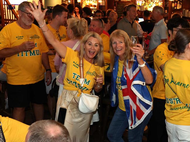 Parents of Australian swimmers enjoying what the little pub they call home during the Paris Games. Picture: Adam Head