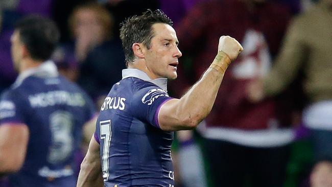 Cooper Cronk of the Storm celebrates try.