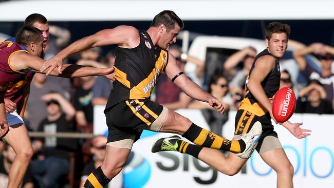 24.5.2014. Brownlow Medallist Shane Crawford plays for hapless Aldinga, against almost-as-hapless O'Sullivans Beach/Lonsdale at Aldinga Oval. Shane Crawford kicks a goal. pic tait schmaal.