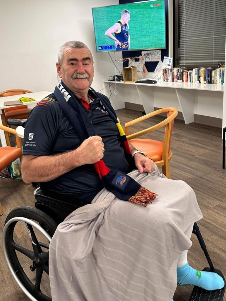 Crows supporters group president Peter Kauschke in hospital.