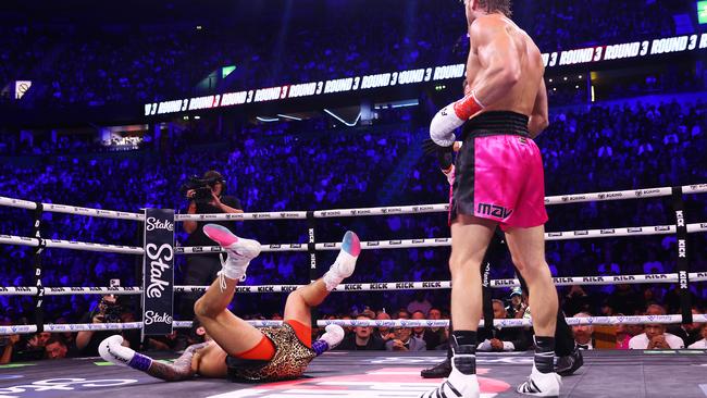 MANCHESTER, ENGLAND - OCTOBER 14: Logal Paul knocks down Dillon Danis during the Misfits Heavyweight fight between Logan Paul and Dillon Danis at AO Arena on October 14, 2023 in Manchester, England. (Photo by Matt McNulty/Getty Images)